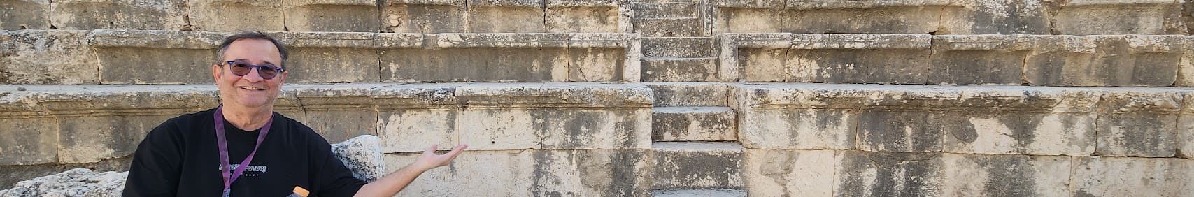 Zahi Shaked guiding at an ancient theater in Israel